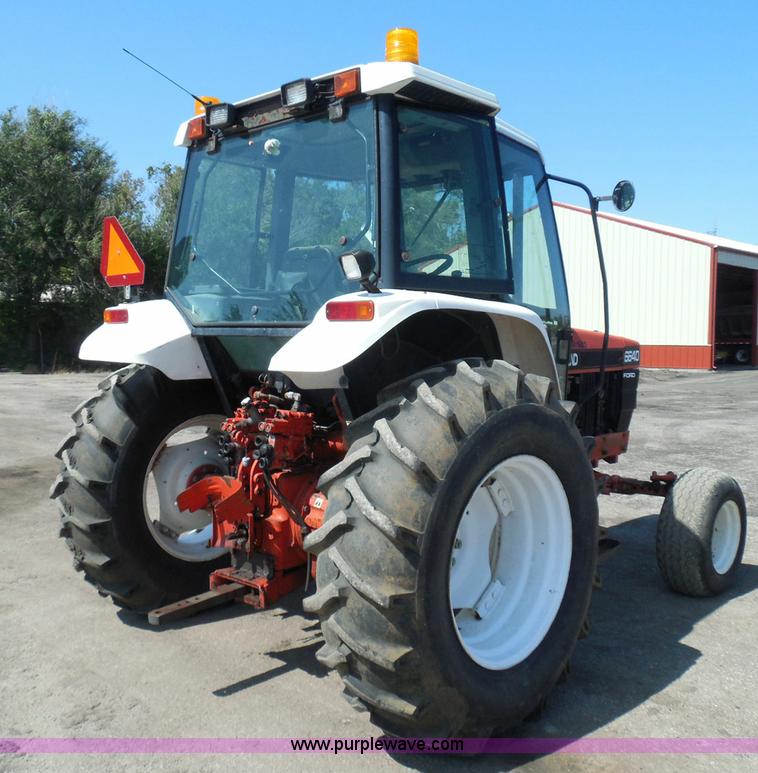 image for item E7948 1995 New Holland 6640 tractor