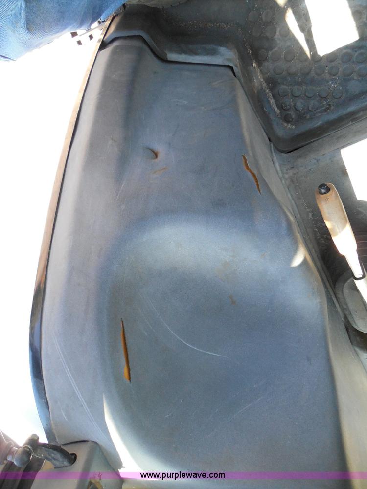 image for item E7948 1995 New Holland 6640 tractor