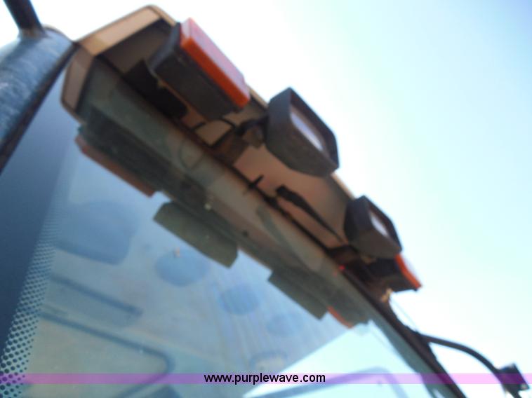 image for item E7948 1995 New Holland 6640 tractor