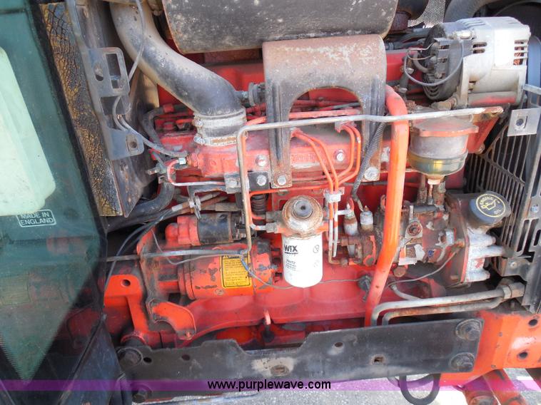 image for item E7948 1995 New Holland 6640 tractor