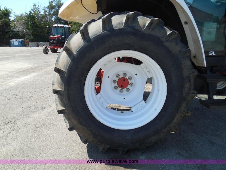 image for item E7948 1995 New Holland 6640 tractor