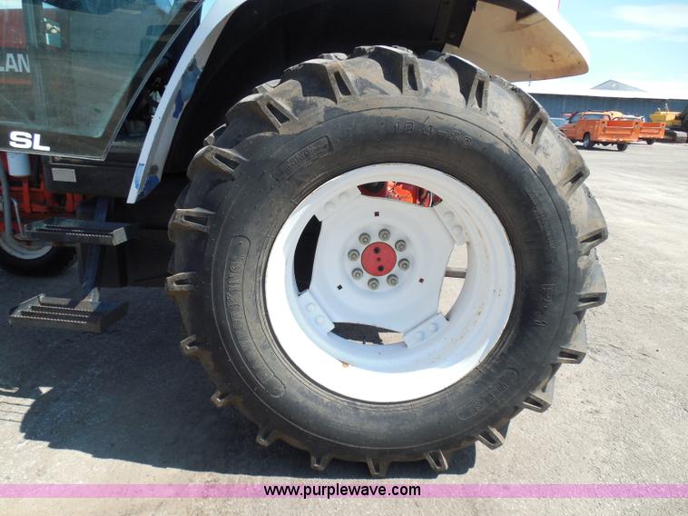 image for item E7948 1995 New Holland 6640 tractor