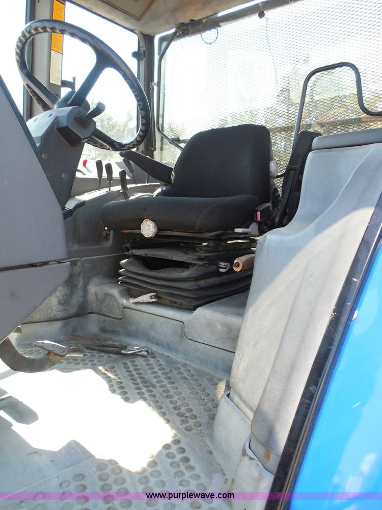 image for item E7949 1995 New Holland 6640 tractor