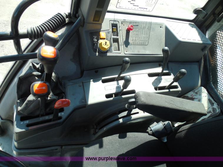 image for item E7949 1995 New Holland 6640 tractor