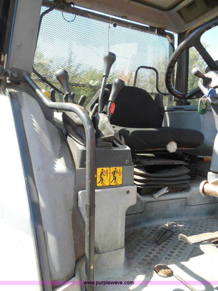 image for item E7949 1995 New Holland 6640 tractor