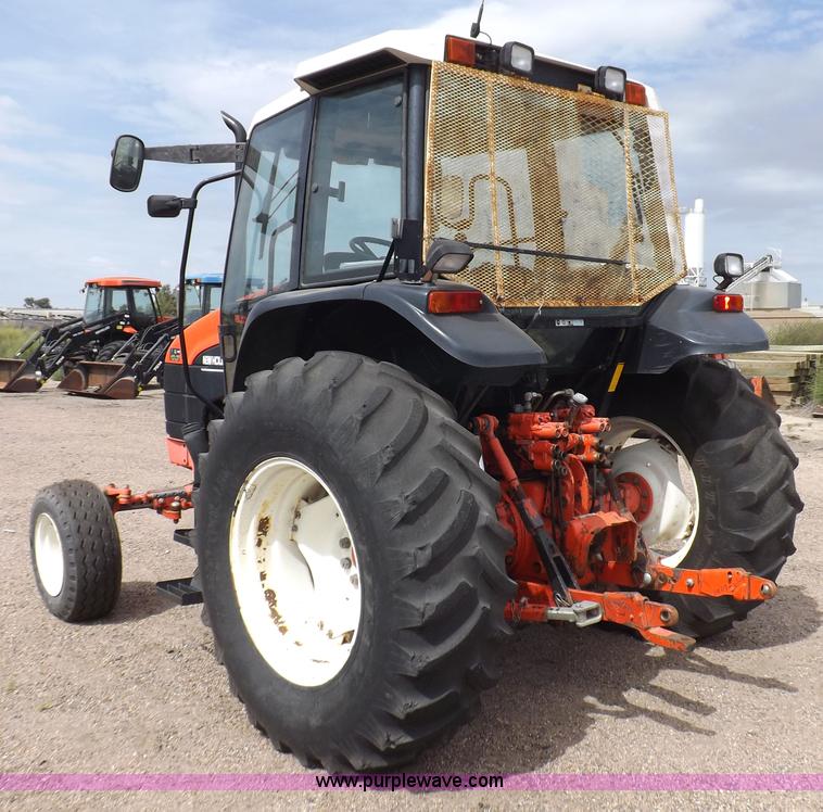 image for item H9104 2000 New Holland TS100 tractor