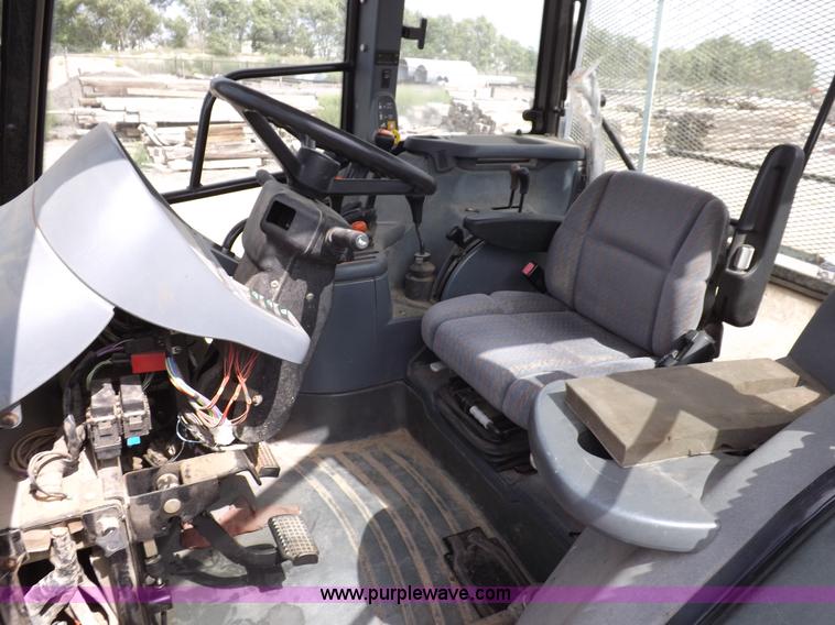 image for item H9104 2000 New Holland TS100 tractor