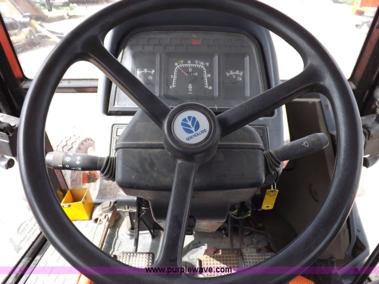 image for item H9104 2000 New Holland TS100 tractor