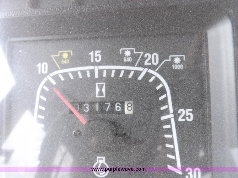 image for item H9104 2000 New Holland TS100 tractor