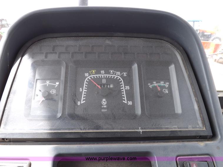 image for item H9104 2000 New Holland TS100 tractor