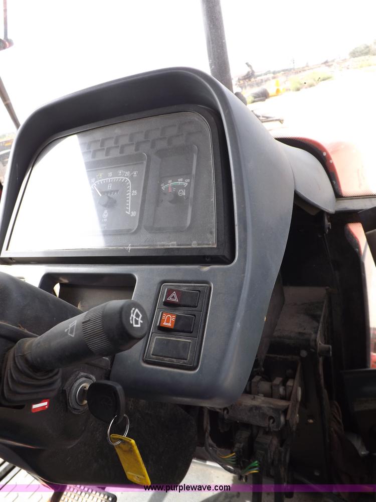 image for item H9104 2000 New Holland TS100 tractor