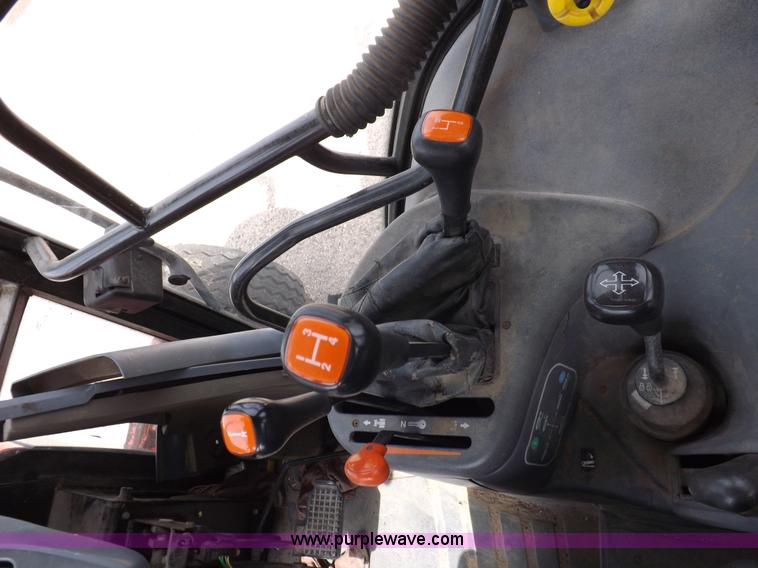 image for item H9104 2000 New Holland TS100 tractor