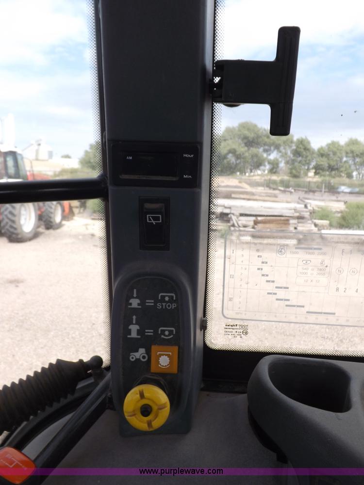 image for item H9104 2000 New Holland TS100 tractor