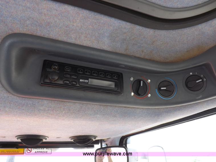 image for item H9104 2000 New Holland TS100 tractor