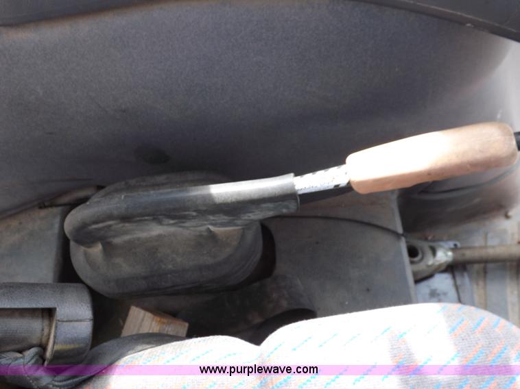 image for item H9104 2000 New Holland TS100 tractor