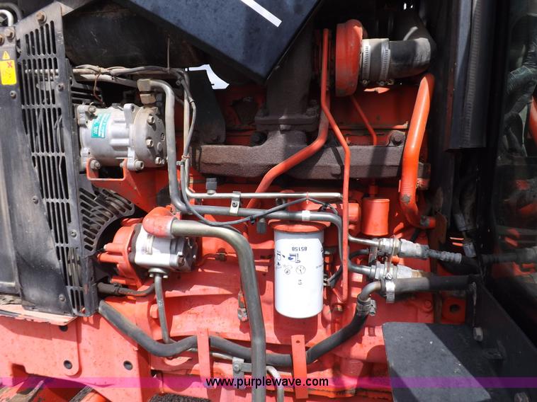 image for item H9104 2000 New Holland TS100 tractor