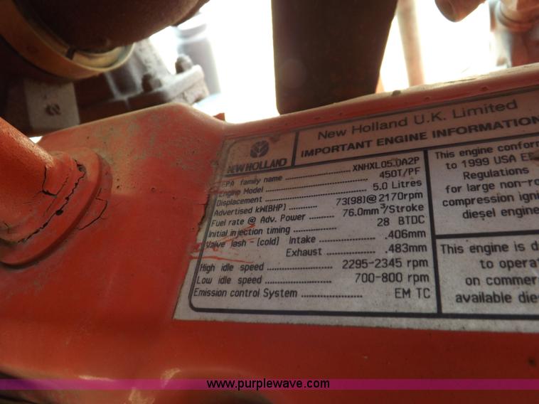 image for item H9104 2000 New Holland TS100 tractor