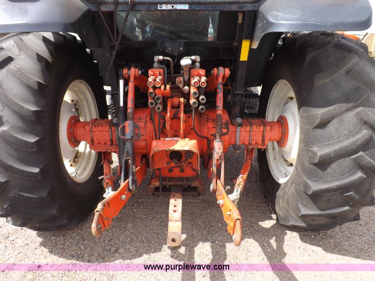 image for item H9104 2000 New Holland TS100 tractor