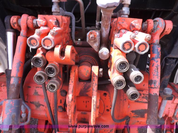 image for item H9104 2000 New Holland TS100 tractor