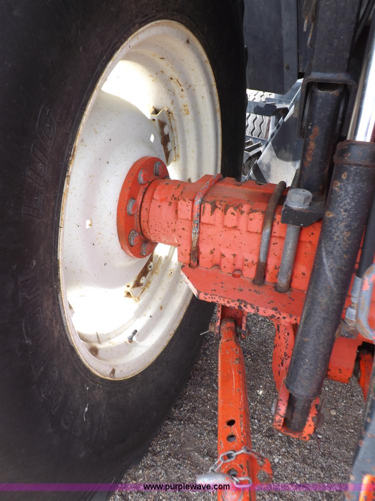 image for item H9104 2000 New Holland TS100 tractor