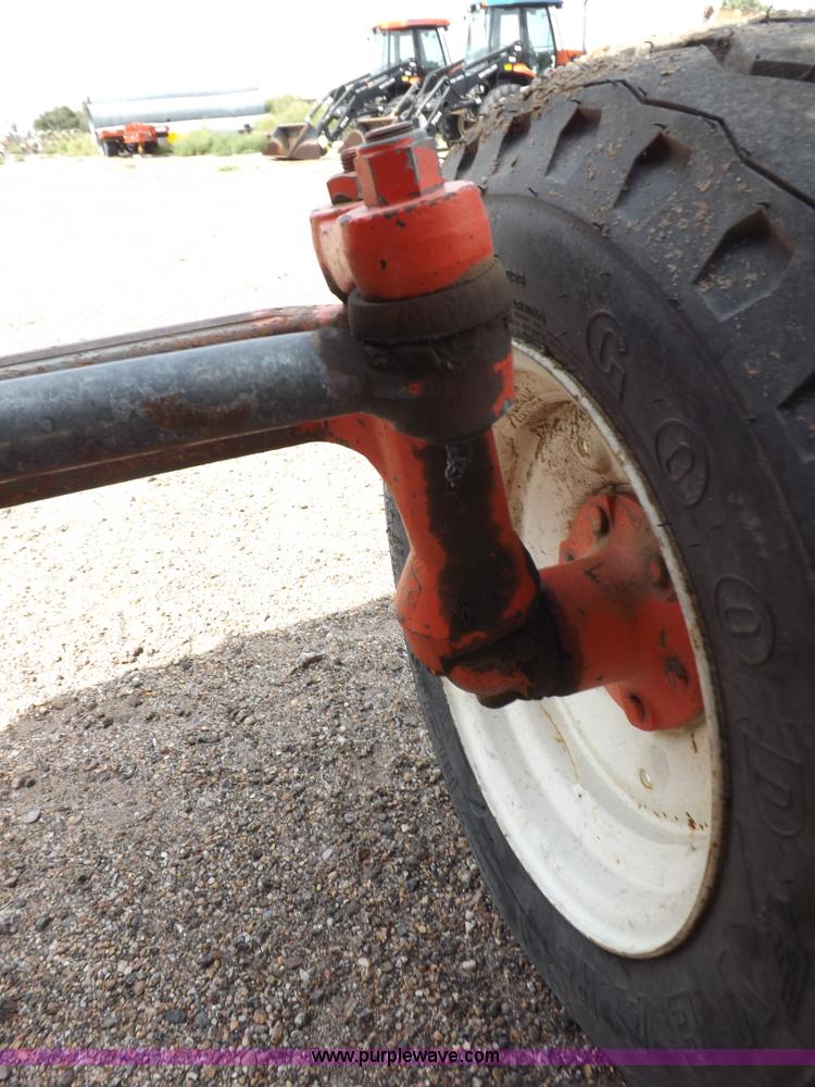 image for item H9104 2000 New Holland TS100 tractor