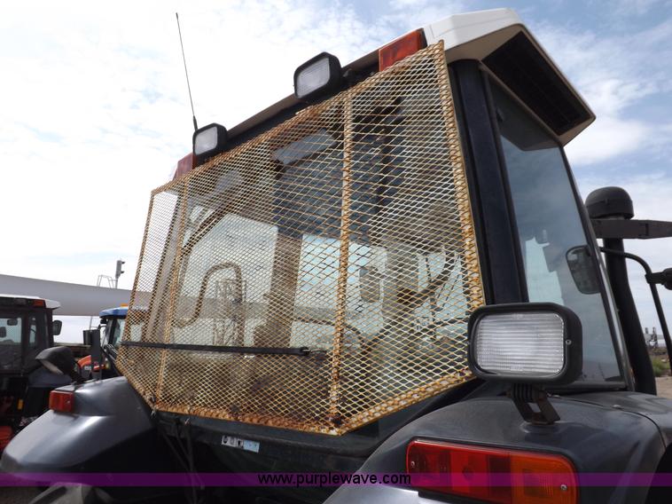 image for item H9104 2000 New Holland TS100 tractor