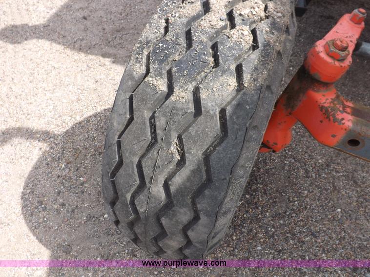 image for item H9104 2000 New Holland TS100 tractor