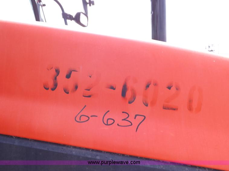 image for item H9104 2000 New Holland TS100 tractor