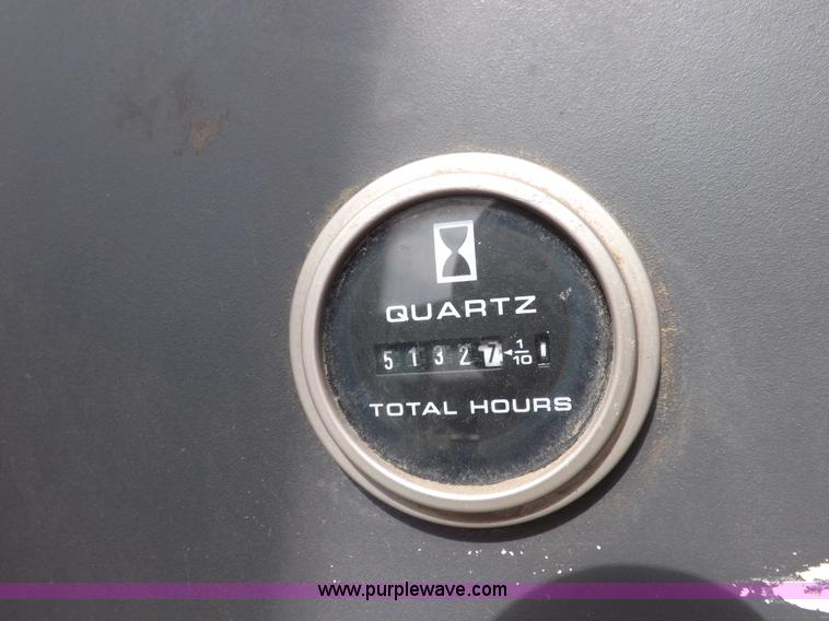 image for item H9105 1997 New Holland 7740SL MFWD tractor