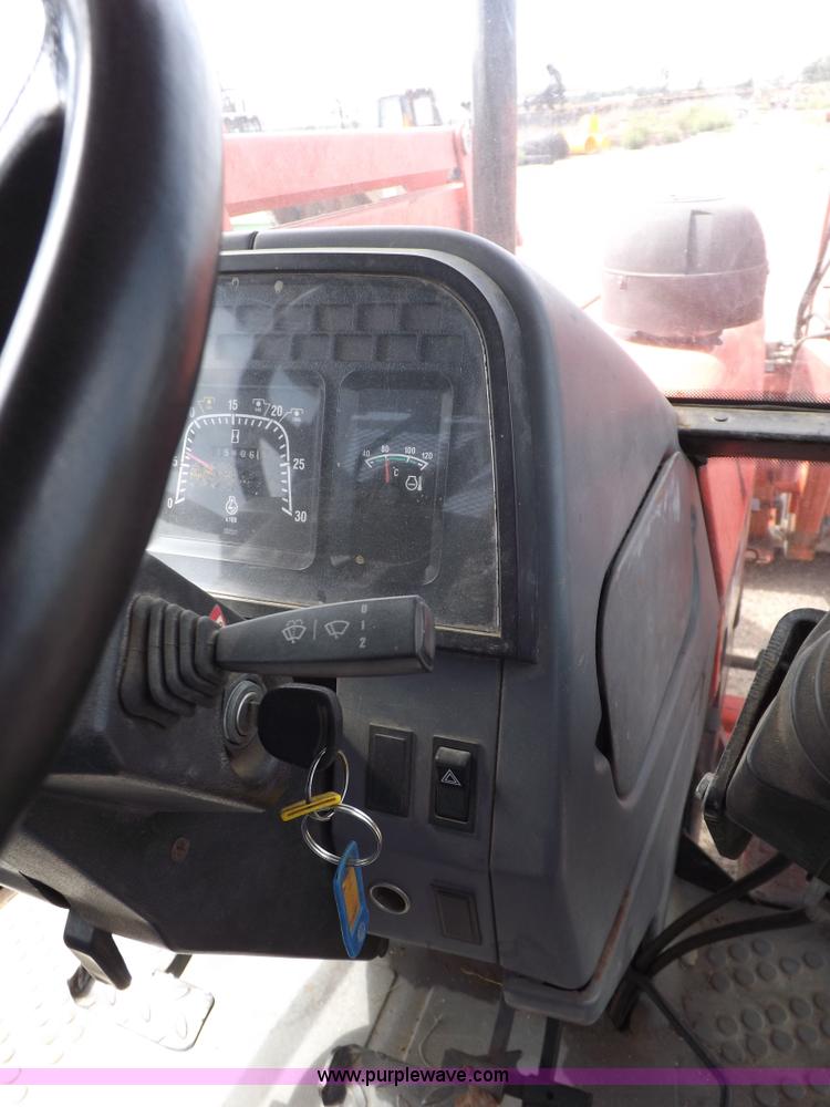 image for item H9105 1997 New Holland 7740SL MFWD tractor