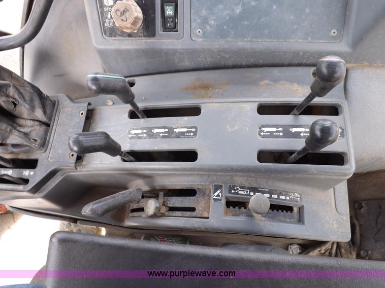 image for item H9105 1997 New Holland 7740SL MFWD tractor