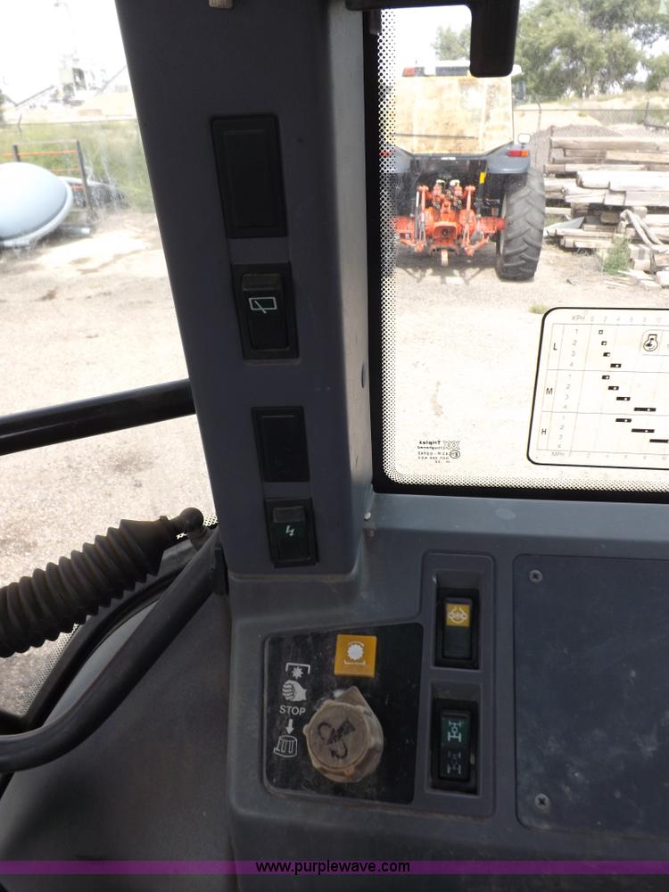 image for item H9105 1997 New Holland 7740SL MFWD tractor