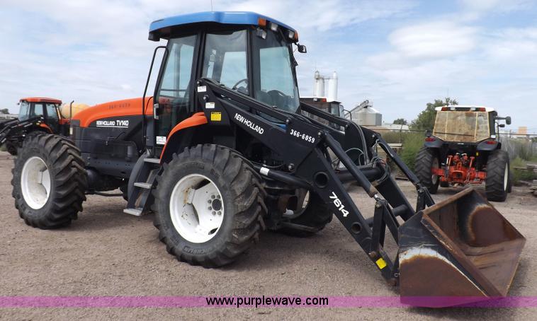 image for item H9106 1999 New Holland TV140 bi-directional MFWD tractor