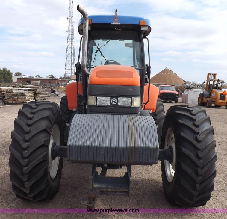 image for item H9106 1999 New Holland TV140 bi-directional MFWD tractor