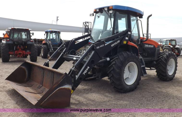 image for item H9106 1999 New Holland TV140 bi-directional MFWD tractor