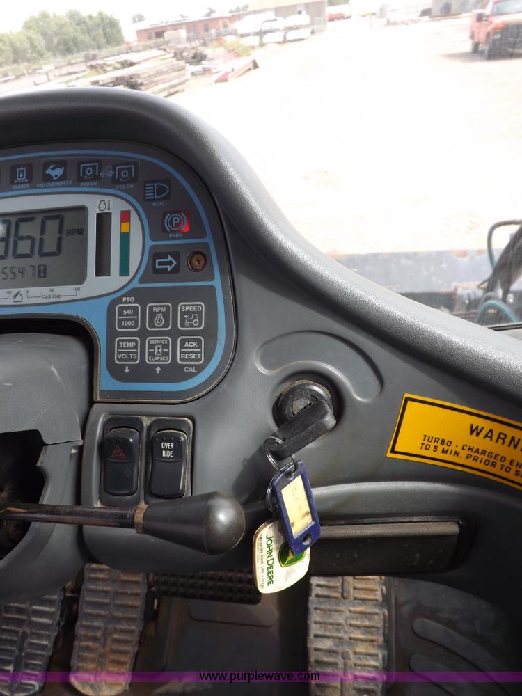 image for item H9106 1999 New Holland TV140 bi-directional MFWD tractor