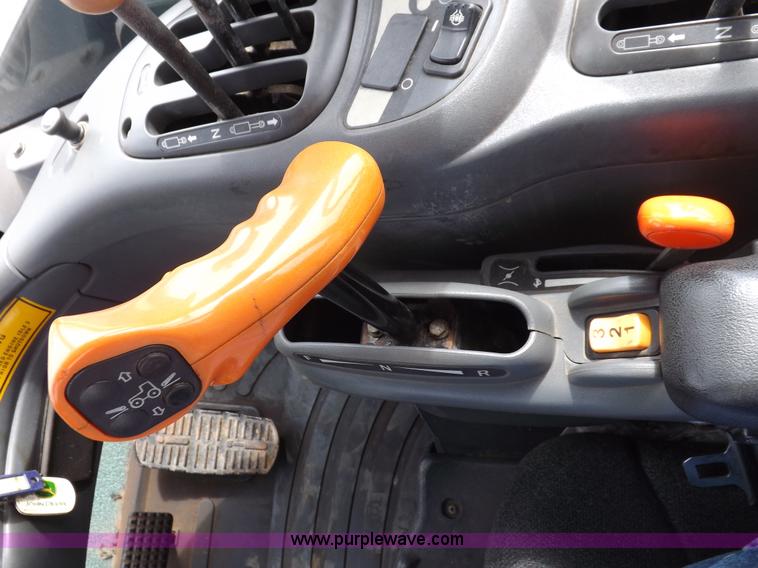 image for item H9106 1999 New Holland TV140 bi-directional MFWD tractor