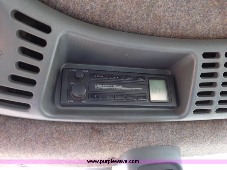 image for item H9106 1999 New Holland TV140 bi-directional MFWD tractor