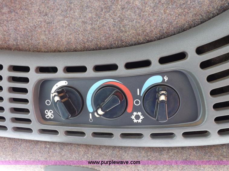 image for item H9106 1999 New Holland TV140 bi-directional MFWD tractor