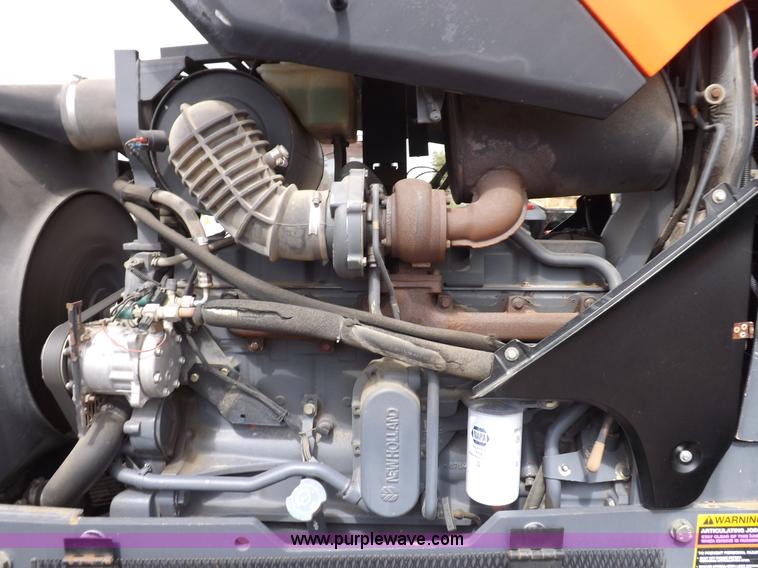 image for item H9106 1999 New Holland TV140 bi-directional MFWD tractor