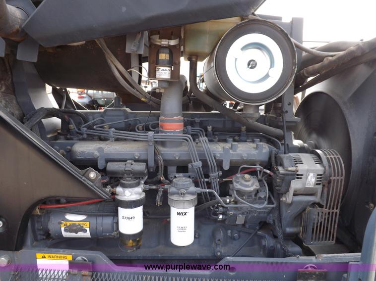 image for item H9106 1999 New Holland TV140 bi-directional MFWD tractor