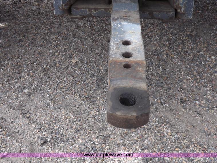 image for item H9106 1999 New Holland TV140 bi-directional MFWD tractor