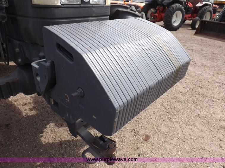 image for item H9106 1999 New Holland TV140 bi-directional MFWD tractor