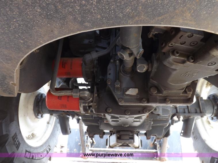 image for item H9106 1999 New Holland TV140 bi-directional MFWD tractor