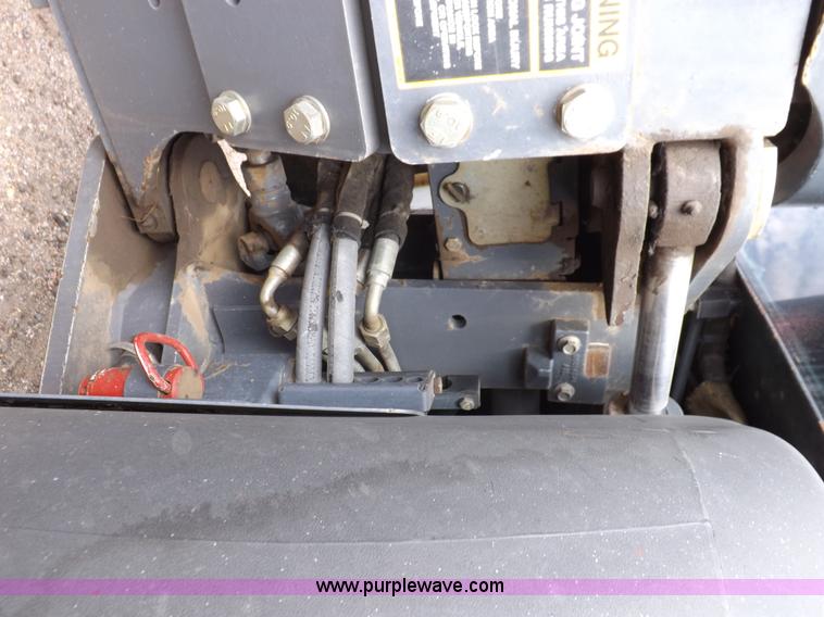 image for item H9106 1999 New Holland TV140 bi-directional MFWD tractor