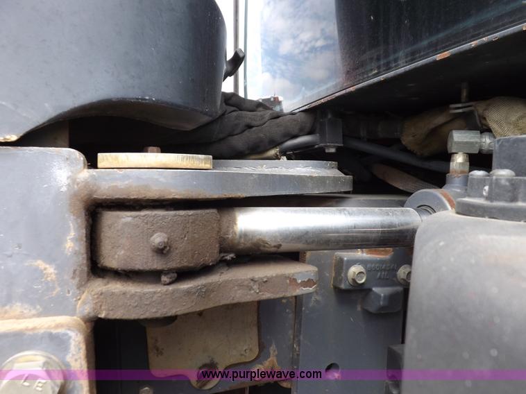 image for item H9106 1999 New Holland TV140 bi-directional MFWD tractor