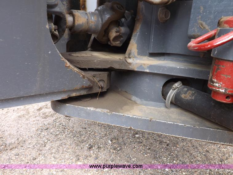 image for item H9106 1999 New Holland TV140 bi-directional MFWD tractor