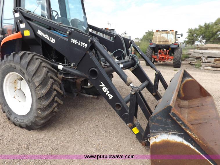 image for item H9106 1999 New Holland TV140 bi-directional MFWD tractor