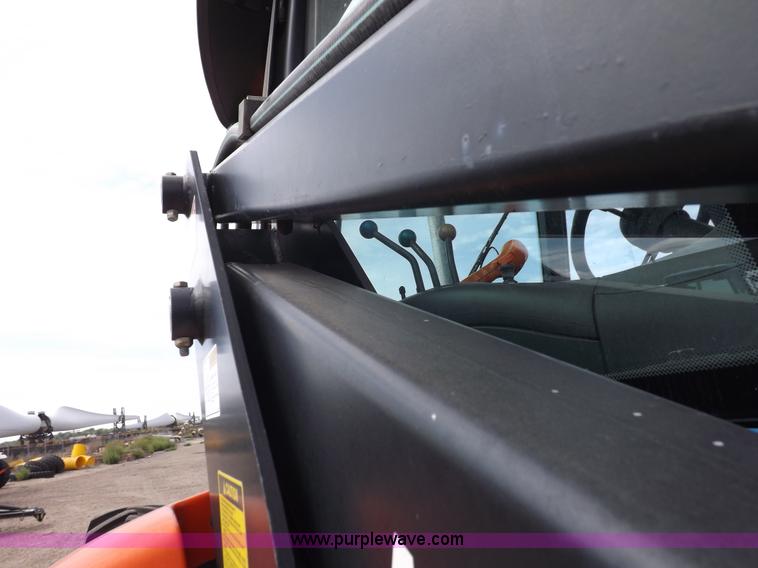 image for item H9106 1999 New Holland TV140 bi-directional MFWD tractor