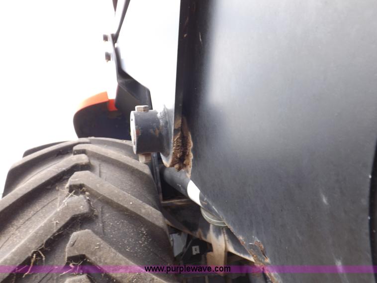 image for item H9106 1999 New Holland TV140 bi-directional MFWD tractor